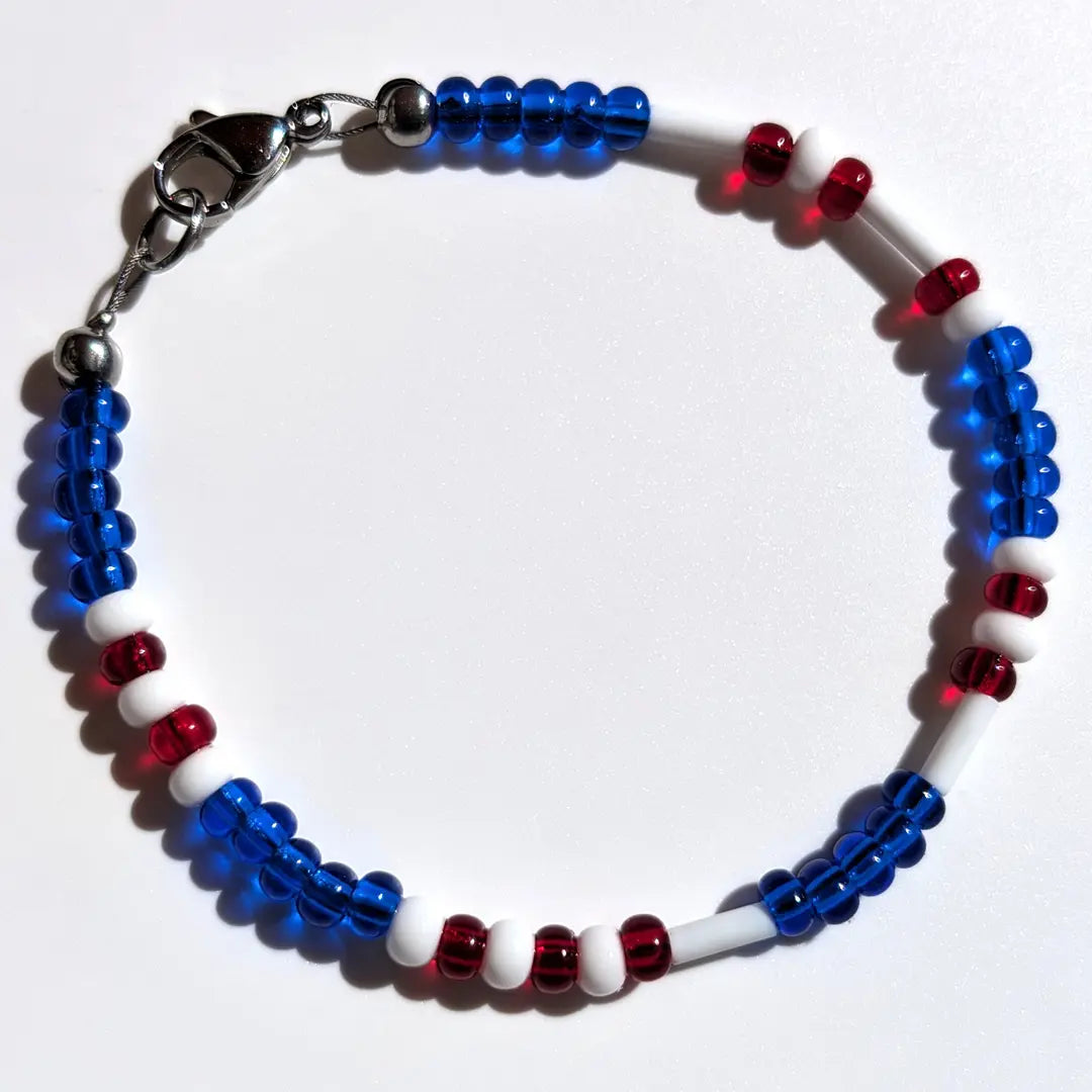 Cheer on the Chicago Cubs with this Morse code bracelet, handcrafted with 100% stainless steel coupled with red and blue Czech glass beads.