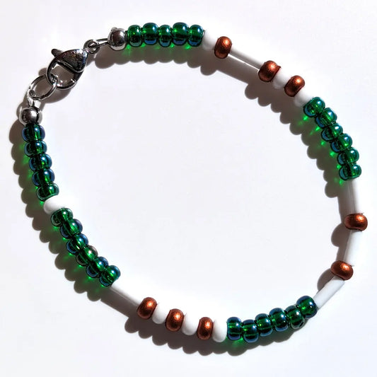 Mesmerizing Mermaid Luster Morse code bracelet, handcrafted with serene blue-green & copper Czech glass beads, holds the secret message “Love.”