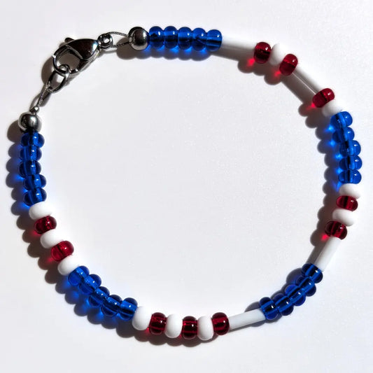 Cheer on the Chicago Cubs with this Morse code bracelet, handcrafted with 100% stainless steel coupled with red and blue Czech glass beads.