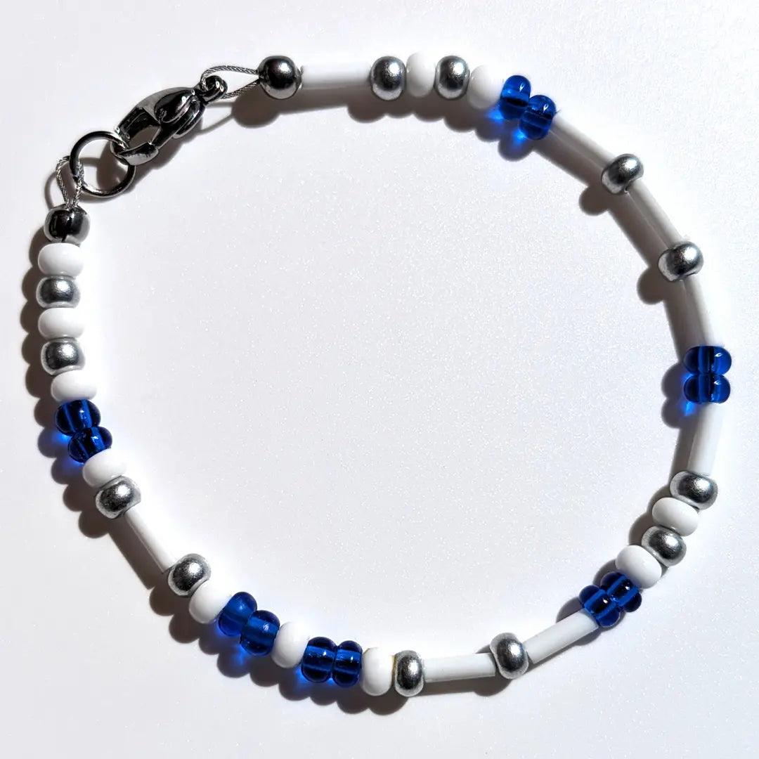 Cheer on the Los Angeles Dodgers with this Morse code bracelet, handcrafted with 100% stainless steel coupled with silver and blue Czech glass beads.