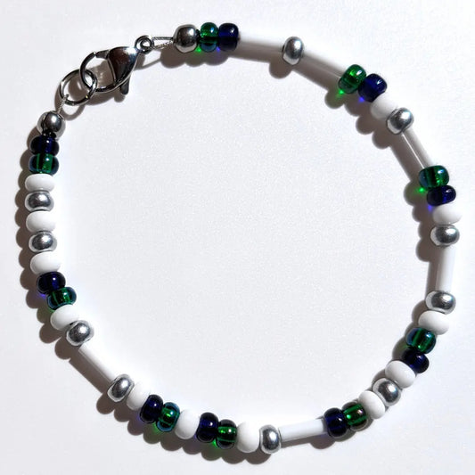 Cheer on the Seattle Mariners with this Morse code bracelet, handcrafted with 100% stainless steel coupled with silver, dark blue & blue green glass beads.