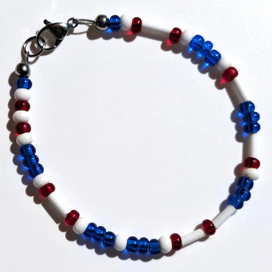 Cheer on the Texas Rangers with this Morse code bracelet, handcrafted with 100% stainless steel coupled with blue and red Czech glass beads.