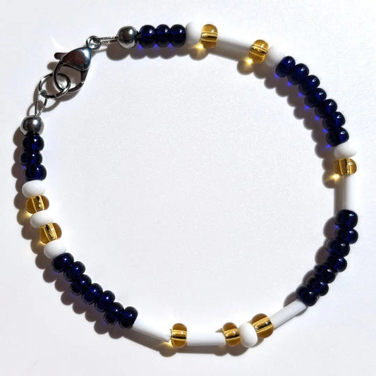 Cheer on the Tampa Bay Rays with this Morse code bracelet, handcrafted with 100% stainless steel coupled with Yellow and Dark blue Czech glass beads.