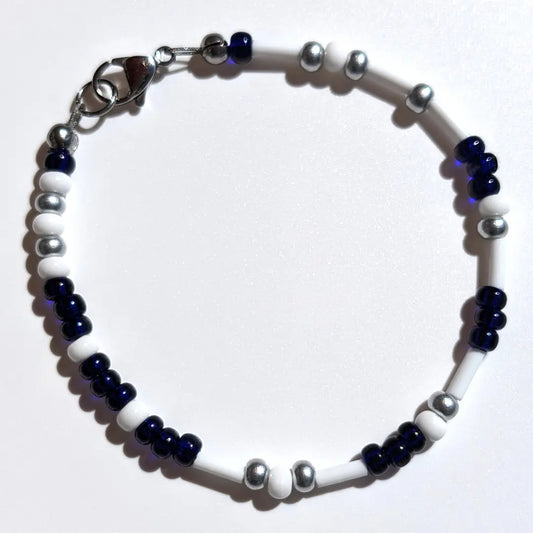 Cheer on the New York Yankees with this Morse code bracelet, handcrafted with 100% stainless steel coupled with Silver and Dark blue Czech glass beads.