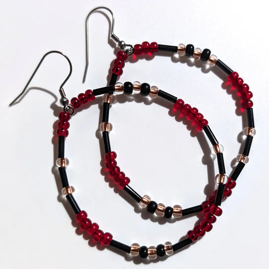 Elegant Cherry Sparkle Morse code earrings, handcrafted with bold, passionate red & clear gold Czech glass beads, hold the secret message “XOXO.”