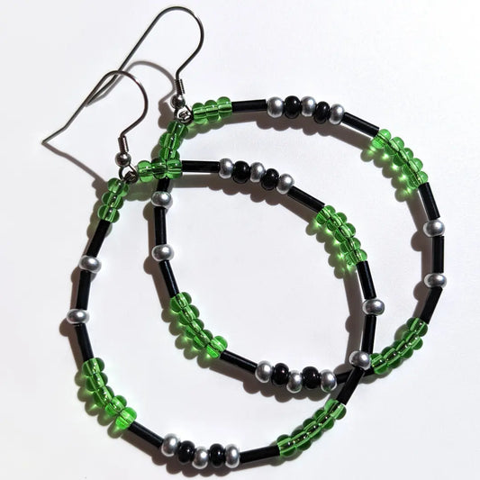 Tranquil Limeade Shimmer Morse code earrings, handcrafted with lush, calming green & silver Czech glass beads, hold the secret message “XOXO.”
