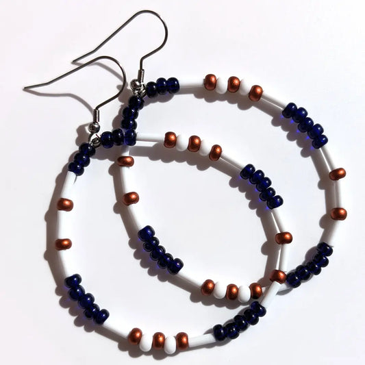 Mysterious Midnight Luster Morse code earrings, handcrafted with deep, intense dark blue & copper Czech glass beads, hold the secret message “XOXO.”